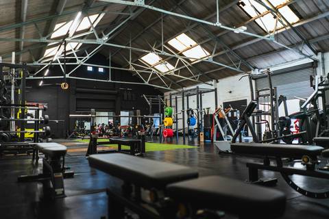 Commercial gym with weights and fitness equipment